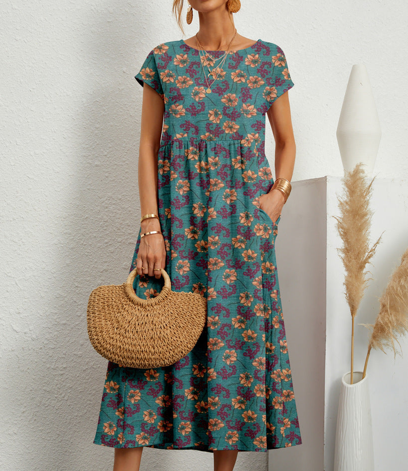 Roselle - Elegancka sukienka w kwiaty zakrywająca brzuch