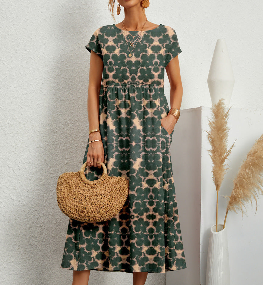 Roselle - Elegancka sukienka w kwiaty zakrywająca brzuch